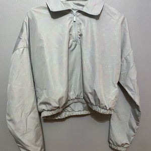 Rue 21, medium, crop top, grey with iridescent writing.